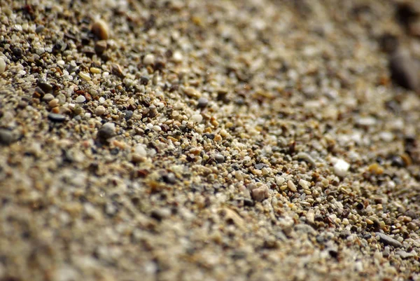 Primo piano di sabbia sulla spiaggia. Mar Mediterraneo, Lato, Turchia . — Foto Stock