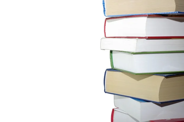 Stapel verschiedener Bücher isoliert auf weißem Hintergrund. Ausschnitt — Stockfoto