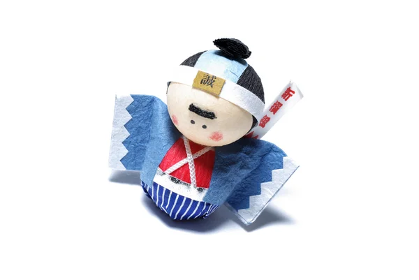 Japanisches Spielzeug mit asiatischen Symbolen isoliert auf weißem Hintergrund. — Stockfoto