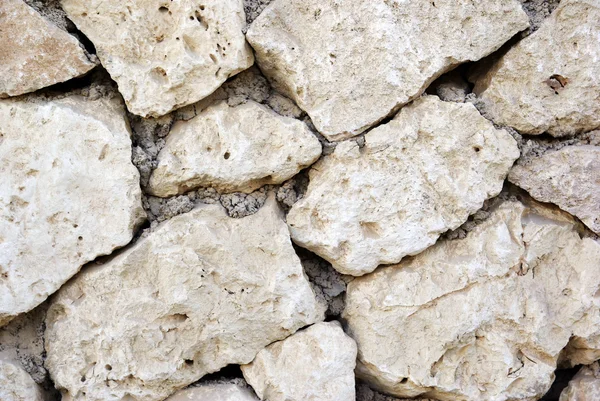 Close-up wall made of stone. Textured background. — Stock Photo, Image