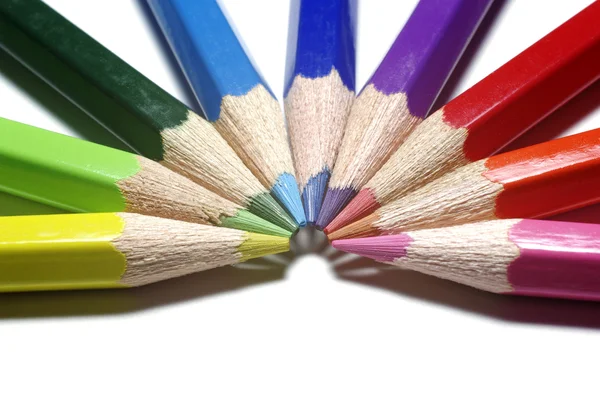 Half-circle of colour pencils isolated on white background. — Stock Photo, Image