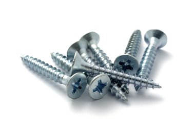 Screws close up photo. Selective focus. Isolated on white backgr clipart