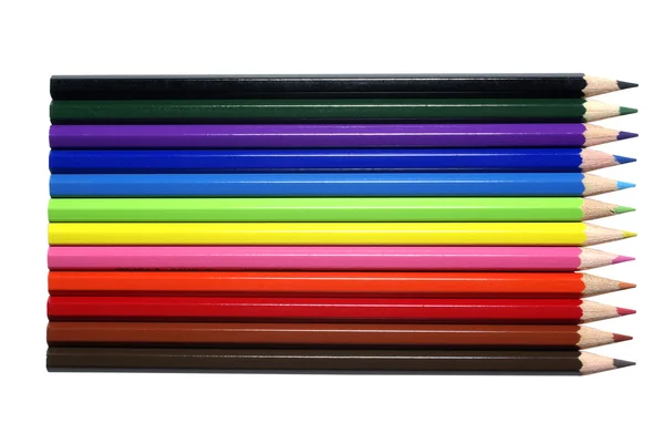 Mnoho barevných tužek izolovaných na bílém pozadí. — Stock fotografie