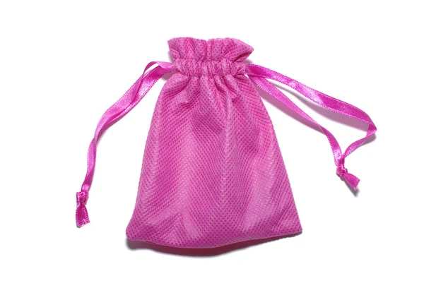 Rózsaszín zsák ajándékok elszigetelt fehér background. — Stock Fotó