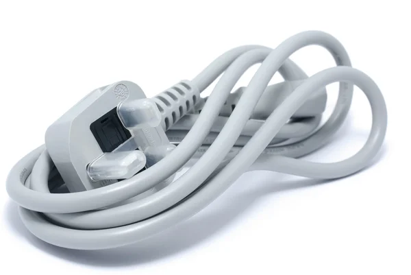 Невикористаний сірий кабель живлення для комп'ютера. Ізольовані на білому фоні — стокове фото