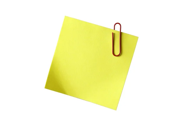 Gelber Klebezettel mit roter Büroklammer, isoliert auf weiß. e — Stockfoto