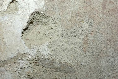 Beton duvar eski hasarlı sıva ve kaymaktaşı üstünde o. abst