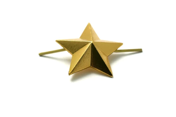Estrela dourada para marcas de ombro isoladas no fundo branco . — Fotografia de Stock