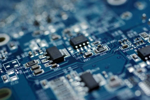 Close up photo of blue PC circuit board. — Stock Photo, Image