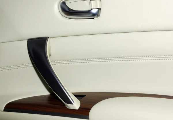 stock image Interior of modern japanese car. Door made of leather, wood and