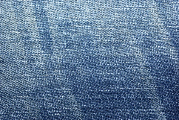 Blauwe versleten jeans doek getextureerde abstracte achtergrond. — Stockfoto
