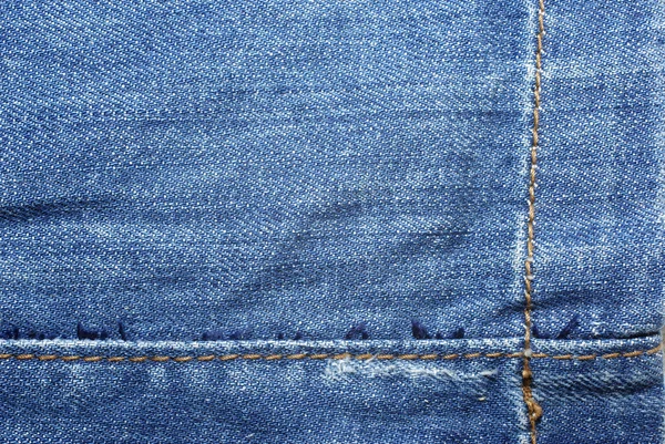 Textle arka plan mavi jeans sarı dikiş ile soyut. — Stok fotoğraf