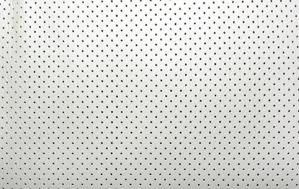 High quality perforated beige leather. Interior of modern japane — Stock Photo, Image