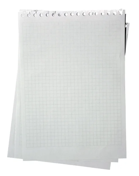 Kariertes Notizpapier mit Kopierraum isoliert auf weißem Hintergrund. — Stockfoto
