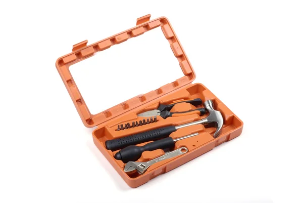 Caixa de ferramentas laranja com conjunto de instrumentos isolados no backgro branco — Fotografia de Stock