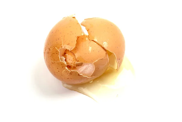 Cracked brown egg isolated on white background. — Stock Photo, Image