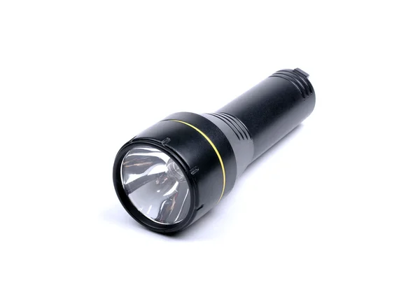 Black plastic flashlight isolated on white background. — Stock Photo, Image