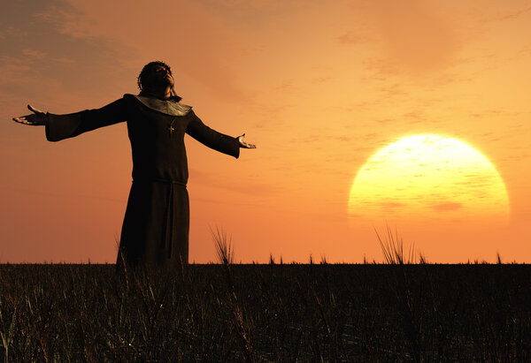 A silhouette of a priest in a landscape.