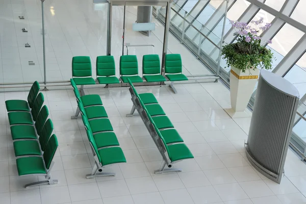 Chairs in departure hall — Stock Photo, Image
