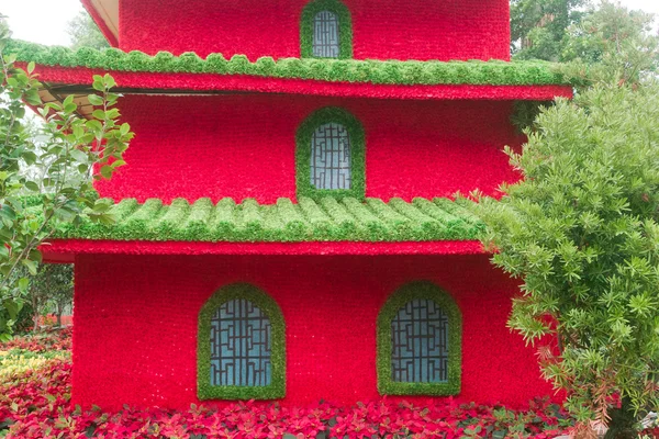 Chinese building model made of flowers — Stock Photo, Image
