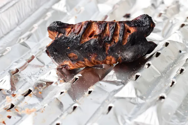 stock image Burnt sausage