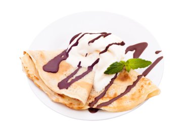 Crepe with ice cream and chocolate topping clipart