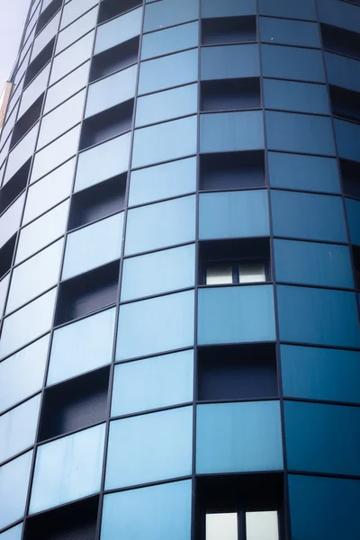 Blue windows of office building Stock Image
