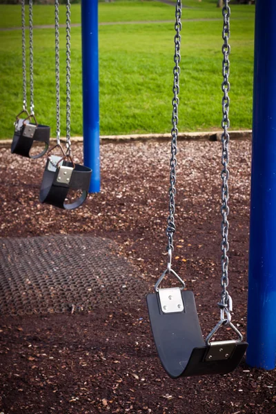 Kids playground swing detail — Stock Photo, Image