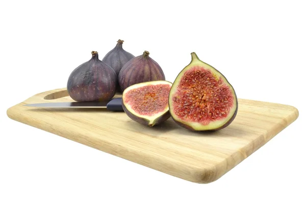 Fruta de higo sobre tabla de madera —  Fotos de Stock