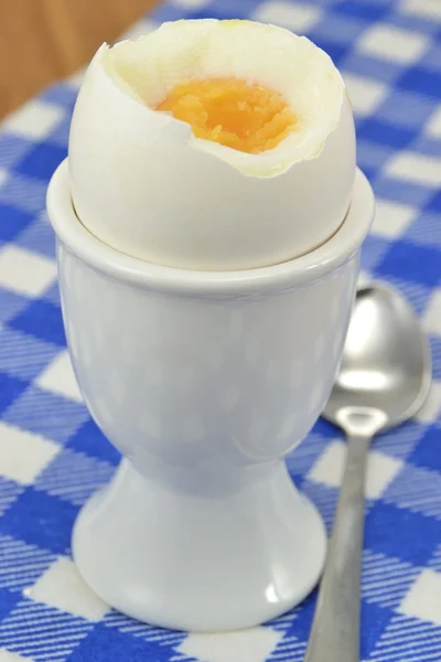 A boiled egg in a cup — Stock Photo, Image