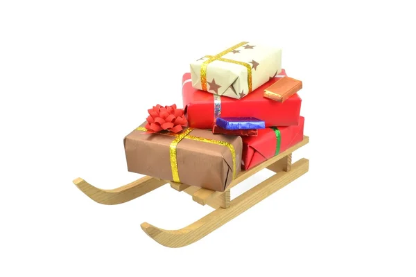 Christmas gifts on a sleigh — Stock Photo, Image