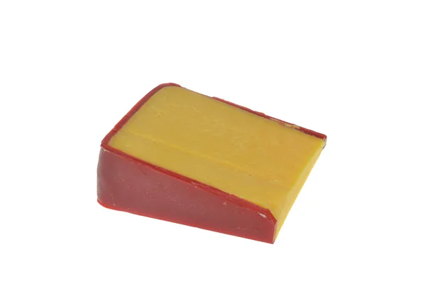 Una cuña de queso cheddar — Foto de Stock