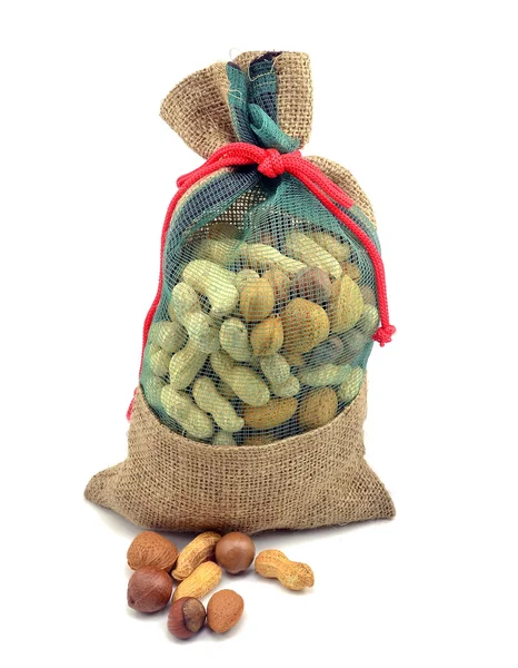 Mixed nuts in hessian bag — Stock Photo, Image