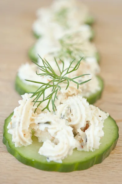Feta cheese on cucumber — Stock Photo, Image