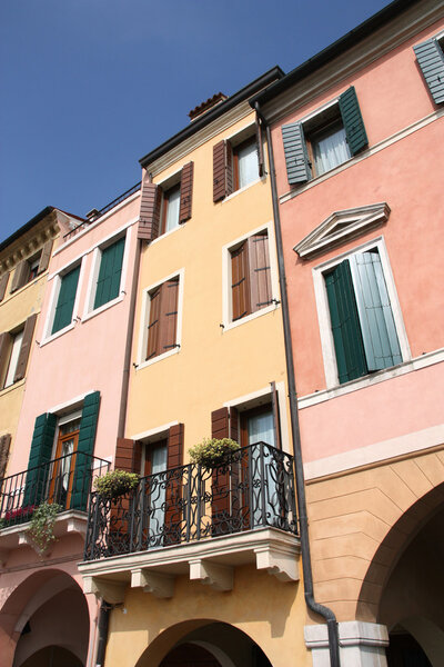 Beautiful mediterranean architecture in Padua, Italy. Colorful street.