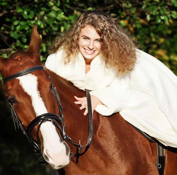 Portrait of beautiful bride with horse — Stock Photo, Image