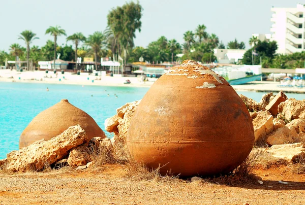 stock image Cyprus lazure beach with nistoric pots, Ayia Napa