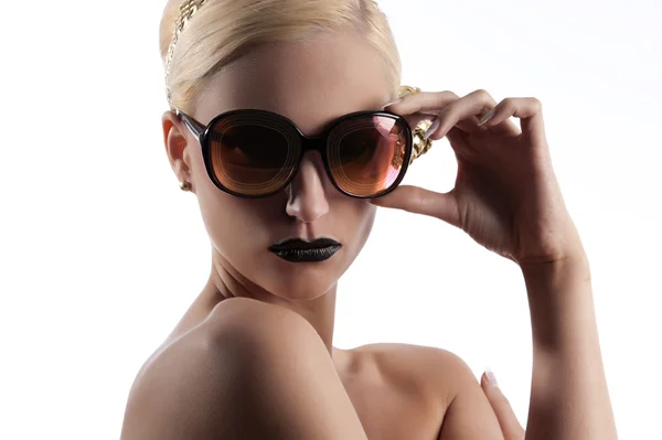 Fashion shot of blond girl with golden sunglasses — Stock Photo, Image