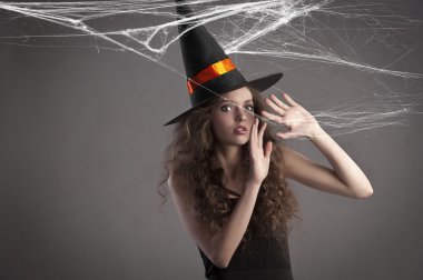Pretty young girl ready for halloween clipart