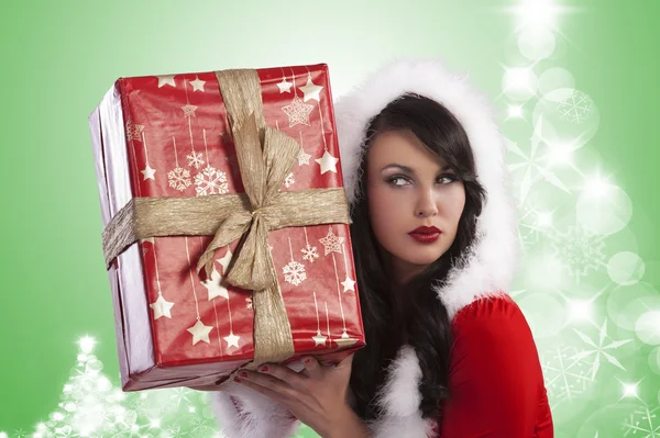 Weihnachtsmann-Dame fragt sich, was in der Geschenkbox ist — Stockfoto