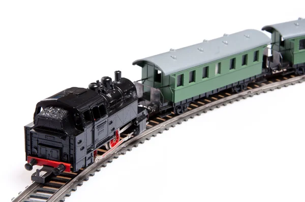 stock image Toy steam train pusing two carriages