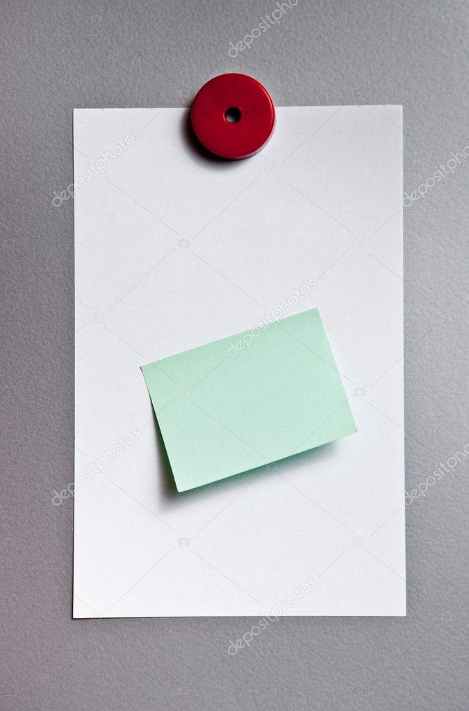 Paper with sticker on magnetic board