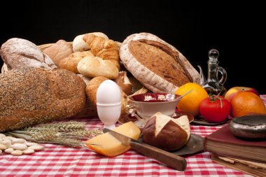 Old fashioned lunch wtih bread and buns clipart