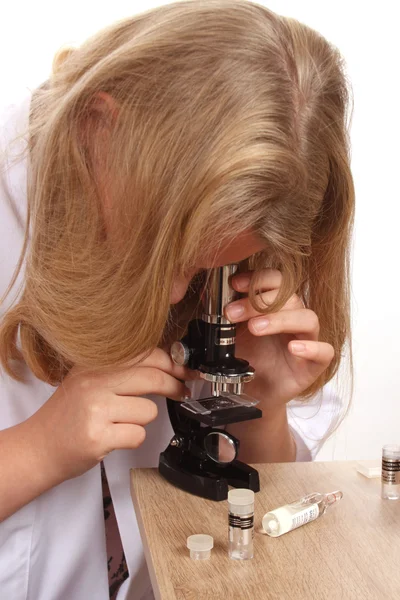 Young female laboratory worker investigating a dead bonsai tree — Stock Photo, Image