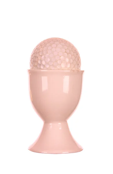 달걀 컵에 golfball — 스톡 사진