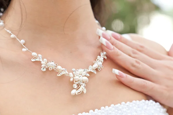 stock image Necklace on a neck of the bride