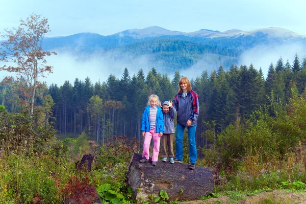 Family on september Carpathian mountain hill — Zdjęcie stockowe