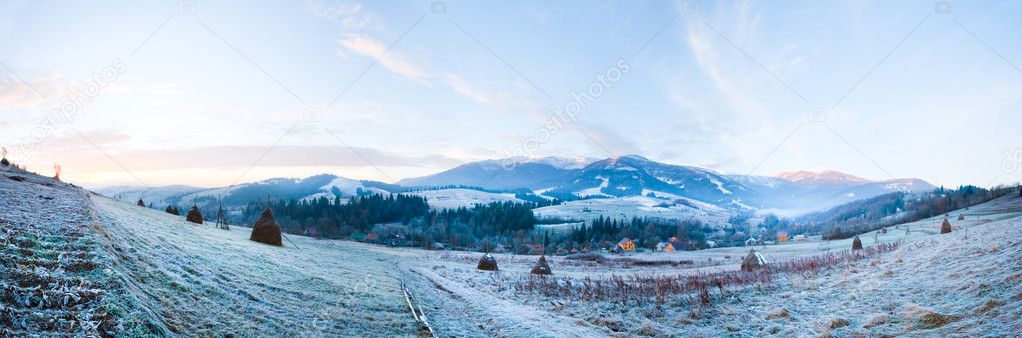 First autumn frost and sunrise in mountain