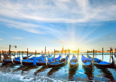 Venice gondolas at sunset clipart