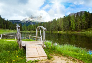 Alpine summer lake view clipart